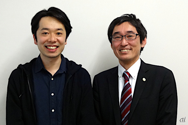 カカクコムの齊藤拓磨氏（左）と日立製作所の諸橋政幸氏