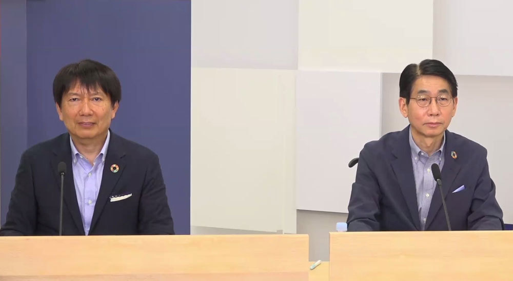 NEC社内のDXを説明する社長兼CEOの森田隆之氏（右）と常務兼CIO兼CISOの小玉浩氏