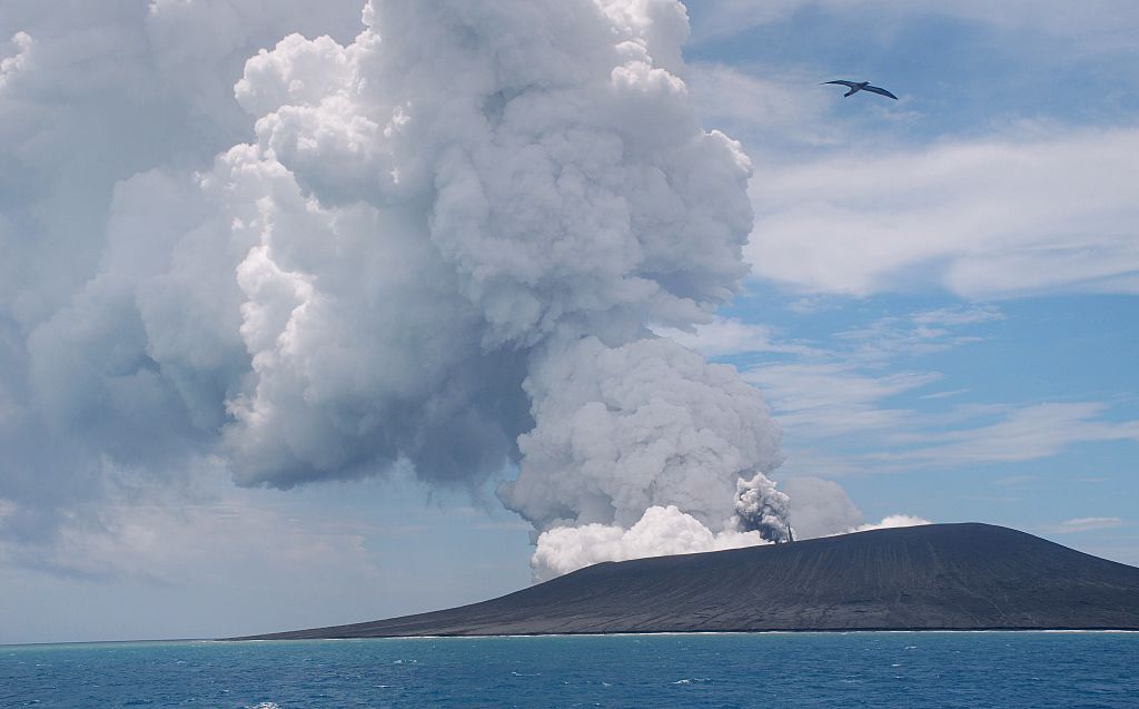 This view taken on January 17, 2015 as steam and gas rise from the eruption of a volcano on Hunga Ha'apai.