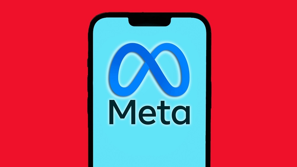 Metaのロゴを表示したスマホ