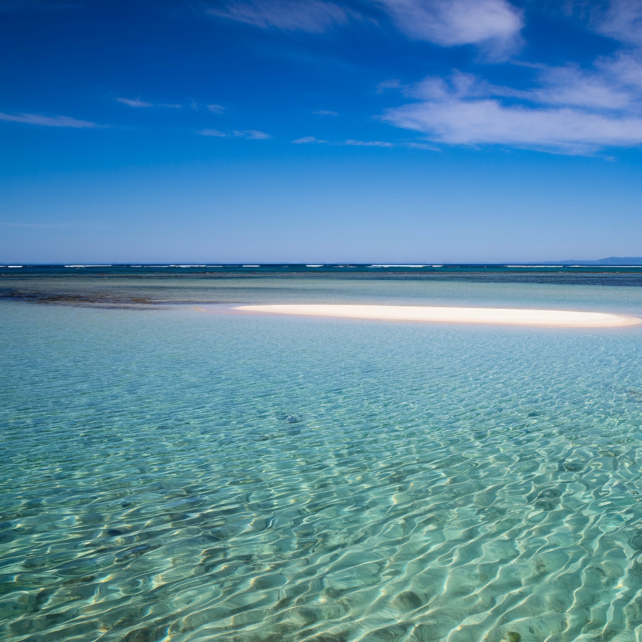 プロンプト:砂のあるきれいで青い浅瀬の海 提供:Sabrina Ortiz/ZDNET via ImageFX